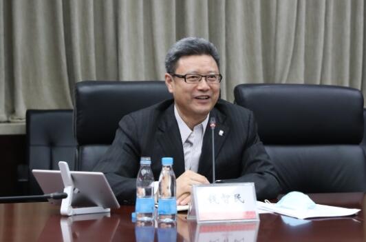 錢智民拜訪中國建材黨委書記、董事長周育先