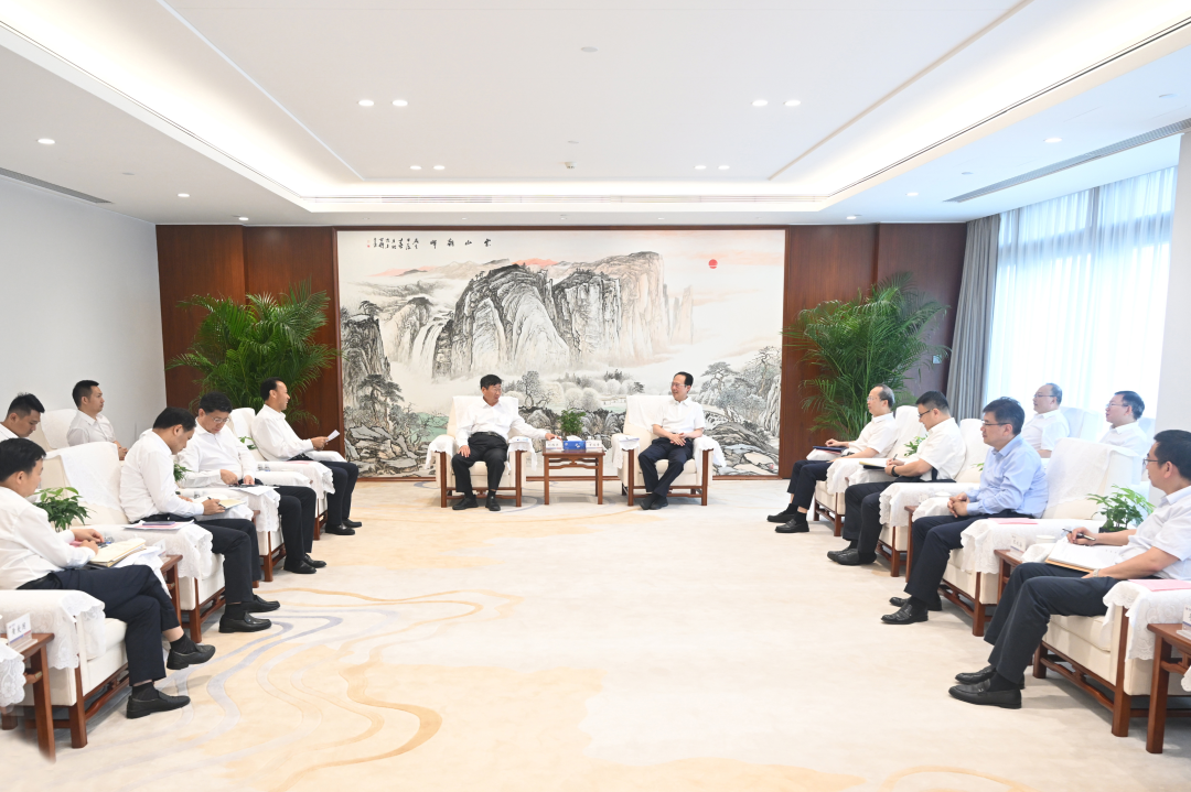 中國電建黨委書記、董事長丁焰章與中國三峽集團董事長、黨組書記劉偉平會談